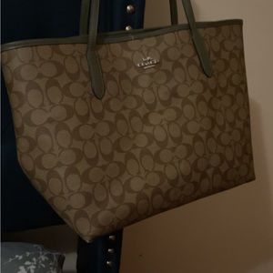 This beautiful signature coach tote barely worn